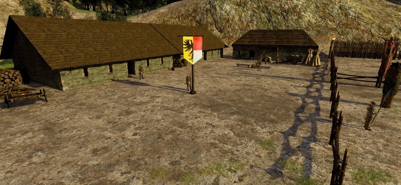 Wooden huts and banners around the arena